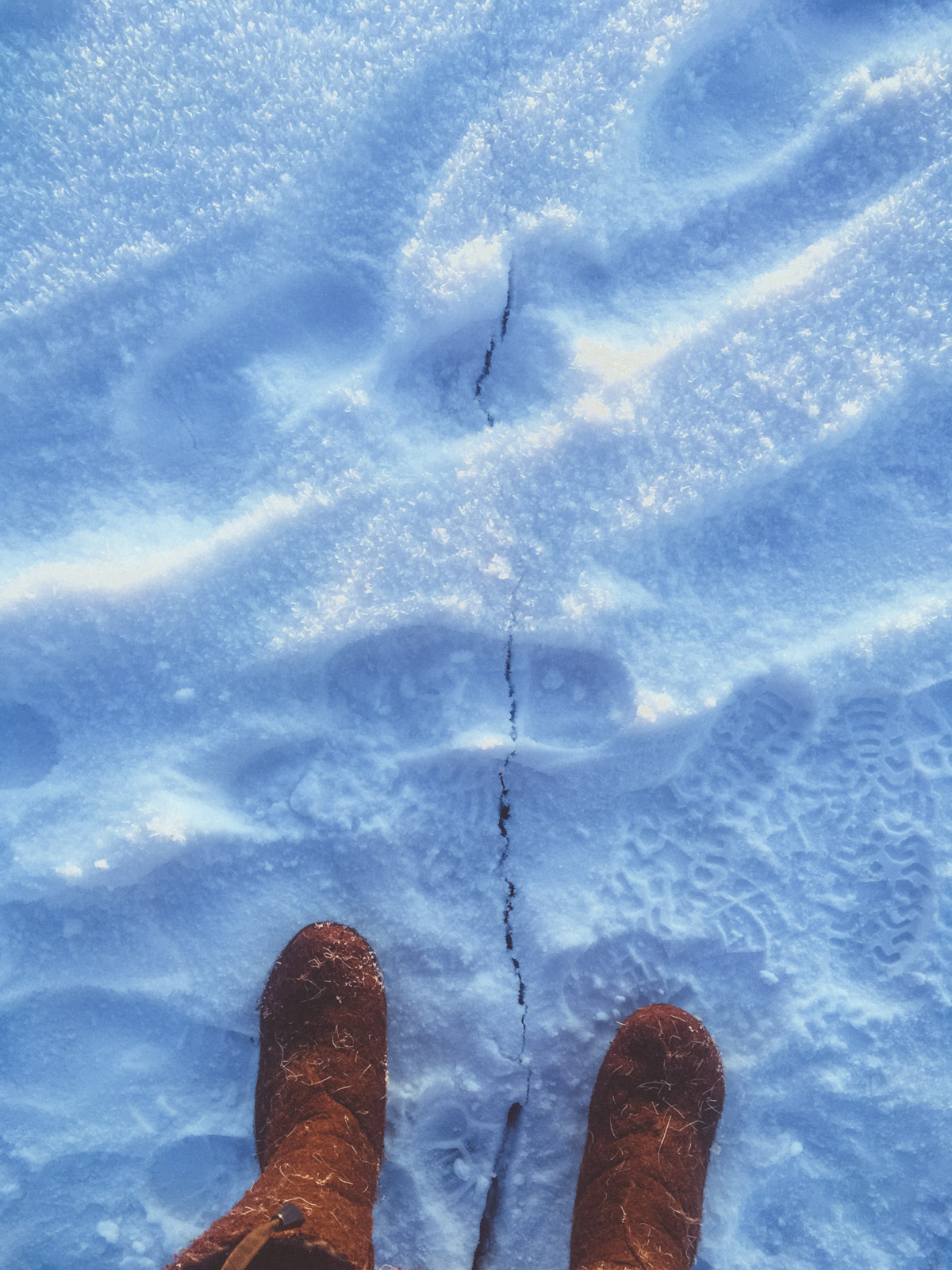 felt boots on snow and ice